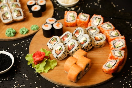 side-view-mix-sushi-rolls-tray-with-ginger-wasabi